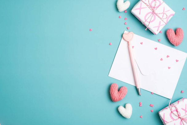 Happy Valentine's day concept. Love letter, gift boxes, hearts on blue background. - Фото, зображення
