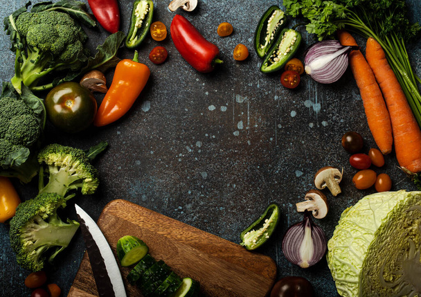 Food cooking background with assorted fresh vegetables on rustic concrete table - Fotografie, Obrázek