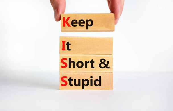 KISS keep it short and stupid symbol. Concept words KISS keep it short and stupid wooden blocks. Beautiful white table, white background. Business KISS keep it short and stupid concept. Copy space. - Fotoğraf, Görsel