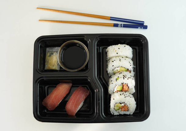 Tray with assorted pieces of sushi. California roll. - Fotografie, Obrázek