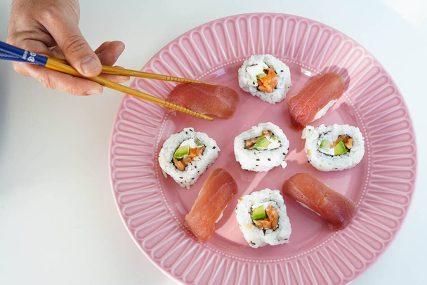 Plate with assorted pieces of sushi. - Photo, Image