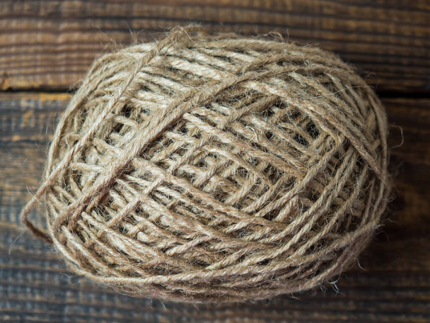 Hemp rope close up on wooden background - Foto, Imagem