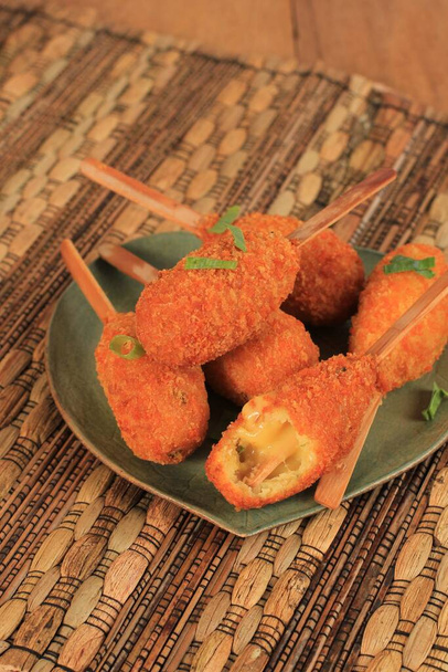 Chicken Sempol, Indonesian Food. Sempol is a Snack Made From Tapioca Flour and Chicken, and Served with Stickwith Mozarella Cheese Inside  - Photo, Image