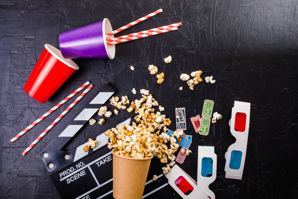 Movie tickets, soda drink plastic straws and popcorn . Home theatre movie or series night concept. Flat lay top view from above with copy space. - Fotó, kép