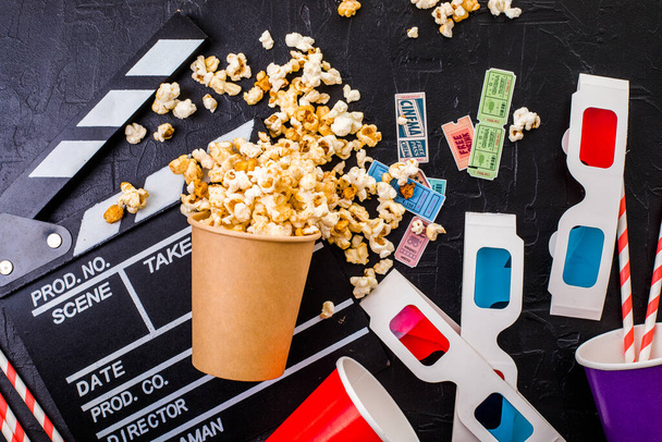 Movie tickets, soda drink plastic straws and popcorn . Home theatre movie or series night concept. Flat lay top view from above with copy space. - Photo, image