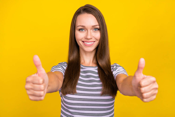 Photo of joyful positive cheerful happy young woman make thumb up show you cool isolated on yellow color background. - Фото, зображення