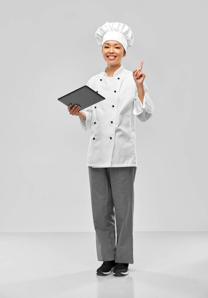 smiling female chef with tablet computer - Foto, Imagem
