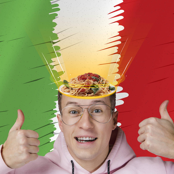 Emotional, excited young man with plate with delicious pasta isolated italian flag background. Concept of worldwide national cuisines - Fotó, kép