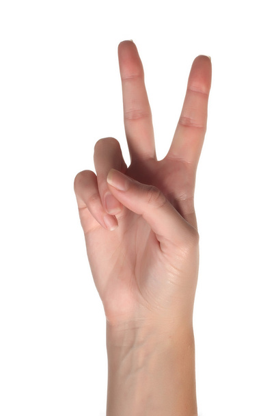 La mano femenina muestra dos dedos
 - Foto, imagen