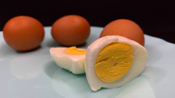 Boiled eggs for breakfast. Protein, yolk and shell of chicken eggs - Zdjęcie, obraz