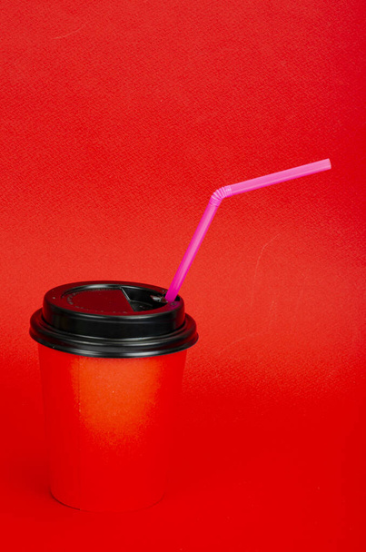 Red eco cardboard glass for drinks. Studio Photo - Photo, Image