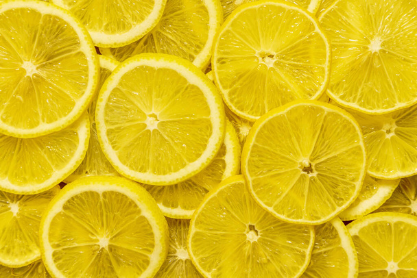 many of fresh lemons closeup wallpaper - Photo, Image
