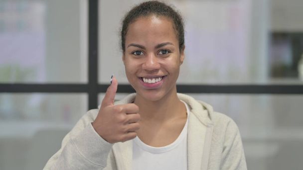 Portrait of African Woman showing Thumbs Up - Fotografie, Obrázek