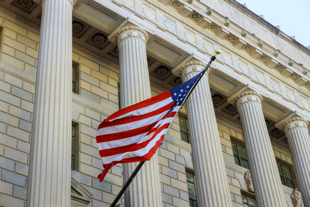 Washington DC building detail with waving American flag in USA - Foto, Imagem