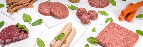 Green meat, various vegan plant based meat alternatives in different meats - steak, minced meat, burger cutlet, nuggets, hot dog sausages, meatballs, strips - Foto, Imagen