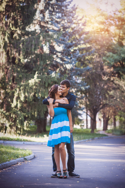 Hugging young couple portrait  - Fotó, kép