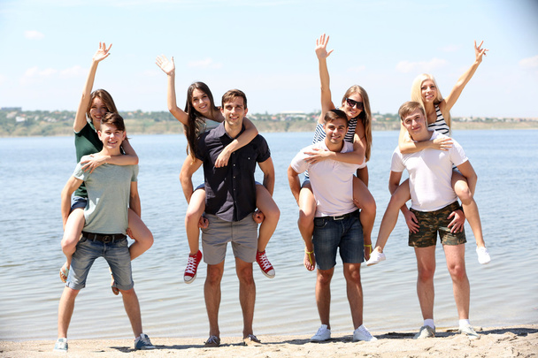 Beautiful young people on beach - Photo, Image