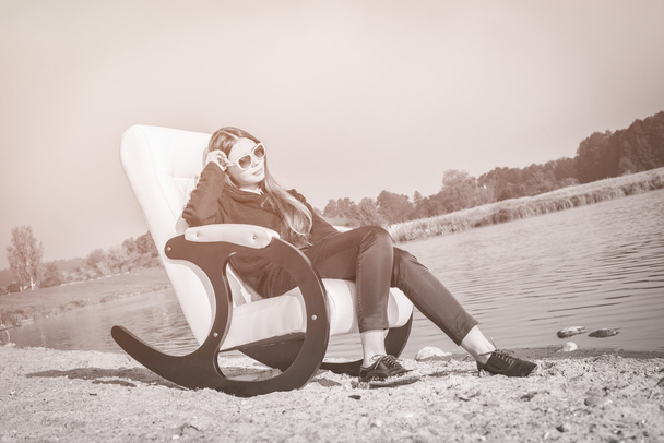 beautiful happy woman relax in chair on lake morning - Valokuva, kuva