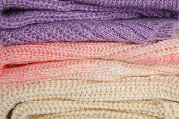 Texture of stylish baby sweaters, closeup - Photo, Image
