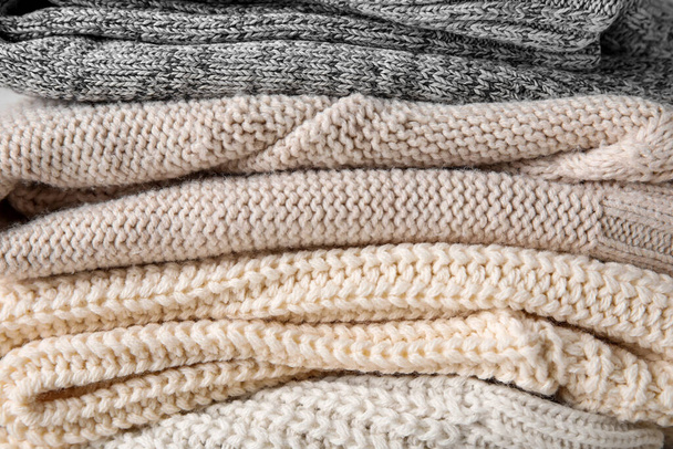 Texture of stylish baby sweaters, closeup - Фото, зображення