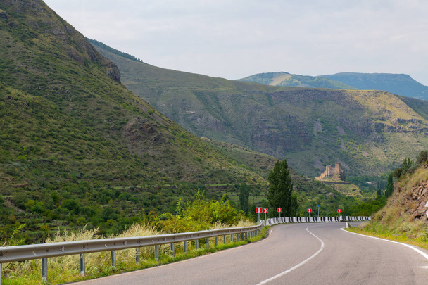 the road turns straight into the mountains of Georgia - Valokuva, kuva