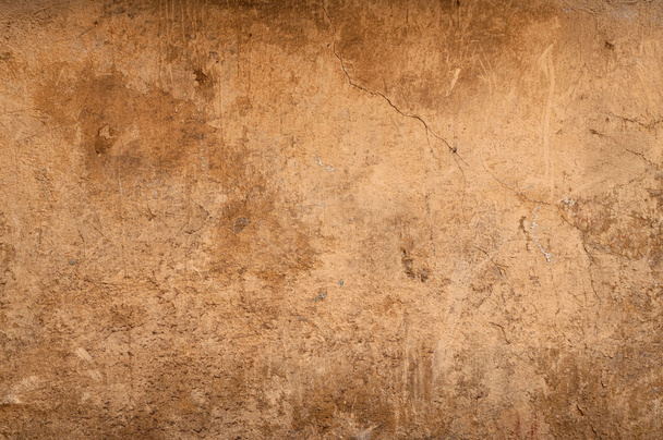 Textura de la pared cubierta de yeso agrietado amarillo
 - Foto, Imagen