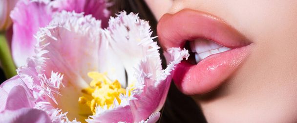 Banner of sensual young woman lips with tulips flowers bouquet. Blowjob and kiss, sensual tongue licks a tulip flower. Sexy female mouth and spring flower. Oral sex, licking. - Foto, Imagem