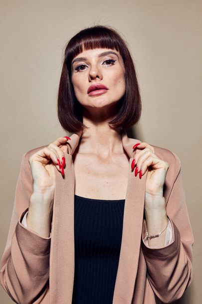 photo pretty woman short haired suit gesturing with hands Lifestyle unaltered - Фото, зображення