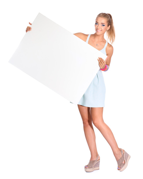 Young woman with blank board banner, isolated on white background - Фото, изображение