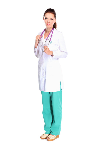 Portrait of young woman doctor with white coat standing in hospital - Φωτογραφία, εικόνα