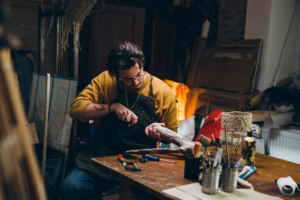 man working in his workshop - Valokuva, kuva
