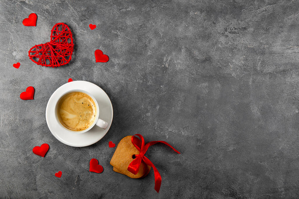  Cup of coffee and heart shaped cookies on grey background, top view, free space for text - Fotografie, Obrázek