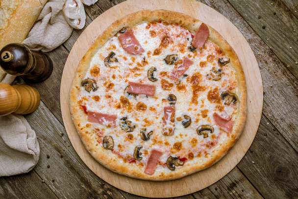 Pizza with ham and mushrooms - Photo, Image