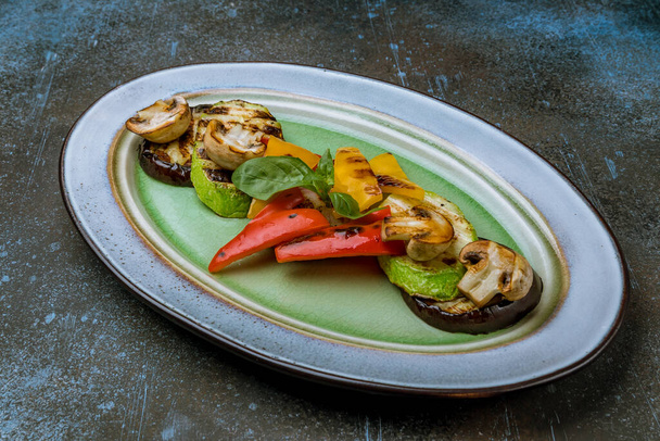 grilled vegetables on a plate - Фото, изображение