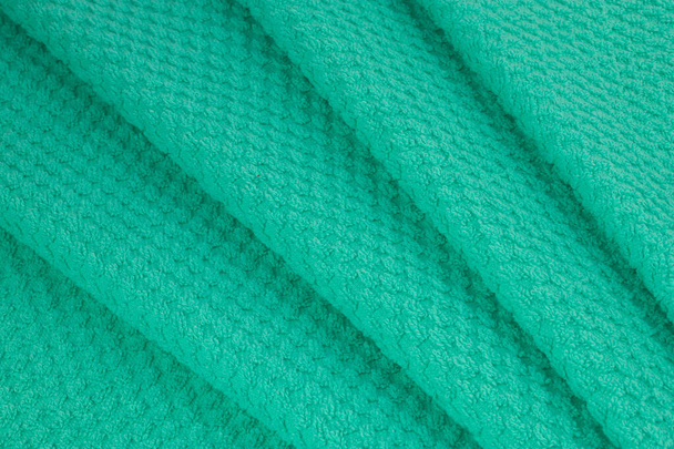 цветное полотенце из хлопка, мягкая махровая ткань, текстура - Фото, изображение