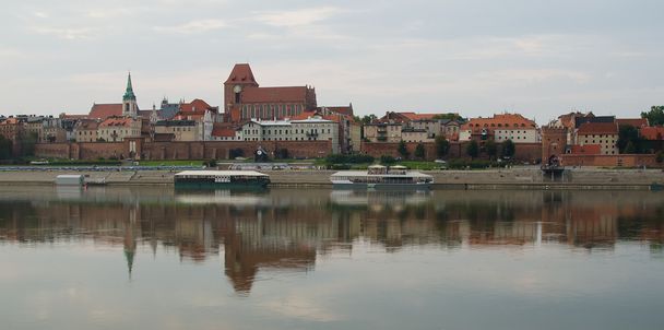 Старый город Торунь (Польша) на закате
 - Фото, изображение