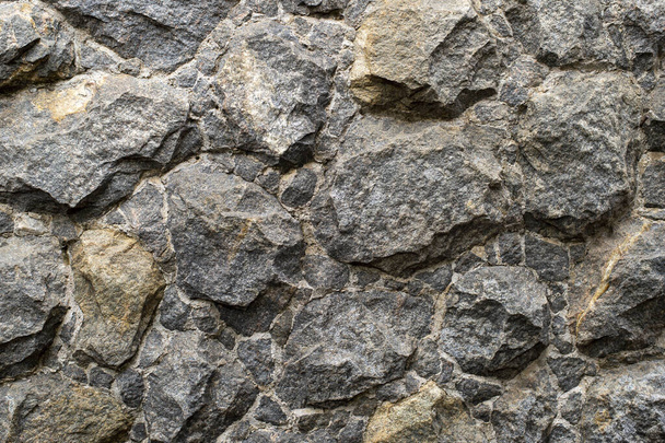 stone gravel texture lining the wall to apply as a background. - Zdjęcie, obraz