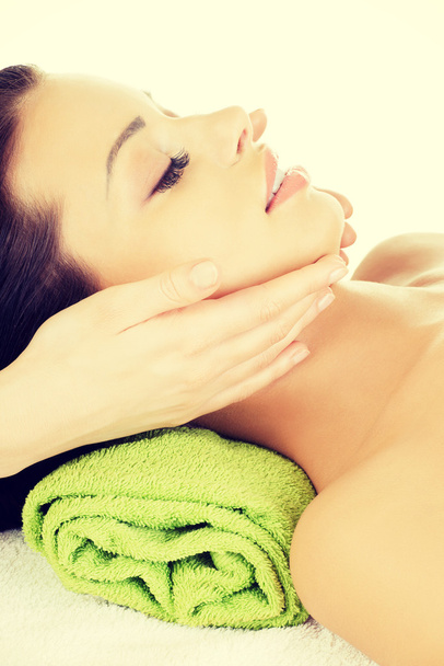 Face massage therapy at spa saloon - Fotó, kép