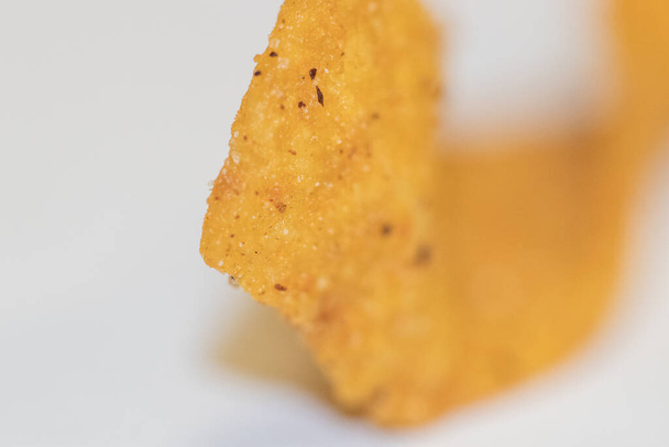 Zamknij kręcone frytki kukurydziane Frito. Wysokiej jakości zdjęcie - Zdjęcie, obraz