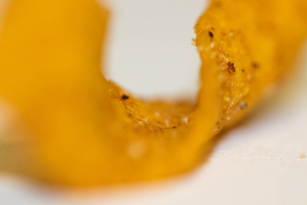 Nahaufnahme von lockigem Frito-Mais-Chip - Foto, Bild