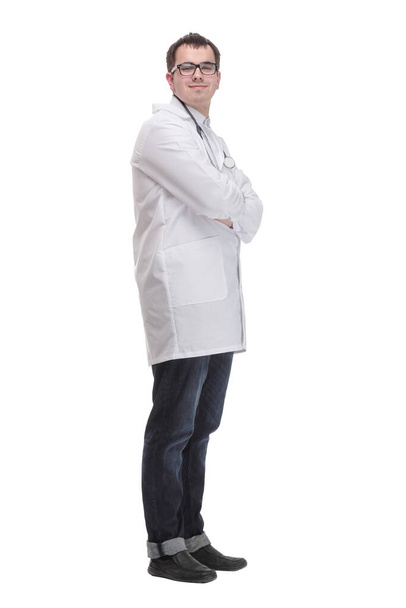 Young doctor man wearing white coat and stethoscope with smile on face - Zdjęcie, obraz
