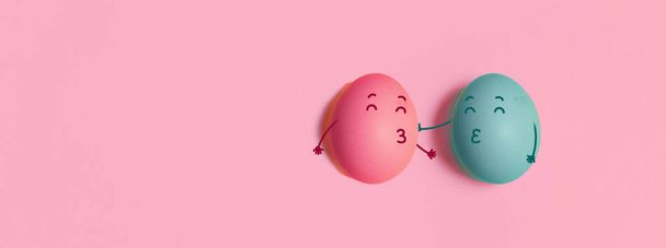 Kiss me. Funny two chicken eggs couple in love on colorful pink background. Valentines day. Cute sale banner or greeting card - Photo, Image