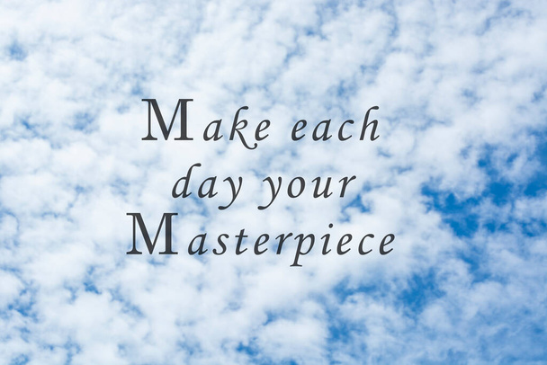 Motivational and inspirational quote - Make each day your masterpiece. On blurred background of bright blue sky and clouds formation - Fotografie, Obrázek