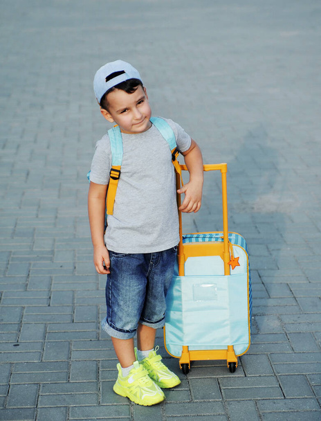 little child with suitcase - 写真・画像