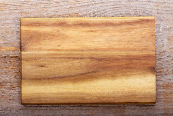 Chopping kitchen boards on a wooden background. Top view flat lay. Space for text. - Φωτογραφία, εικόνα