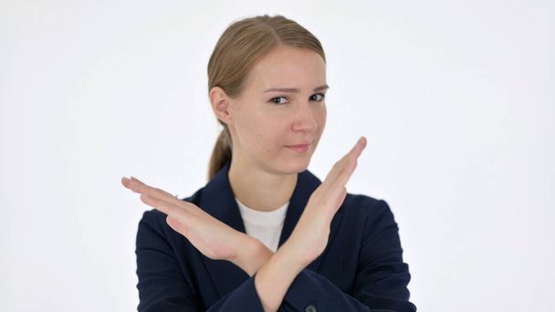 Young Businesswoman Showing No Sign by Arm Gesture on White Background - Photo, Image