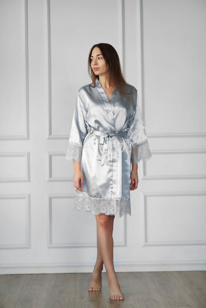 Lingerie and nightwear. Beautiful girl wearing nightgown at home - Foto, Bild