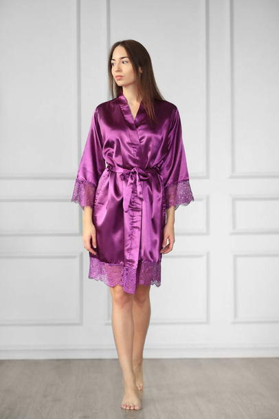 Lingerie and nightwear. Beautiful girl wearing nightgown at home - Valokuva, kuva