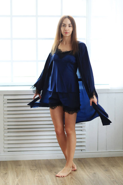 Lingerie and nightwear. Beautiful girl wearing nightgown at home - Fotoğraf, Görsel