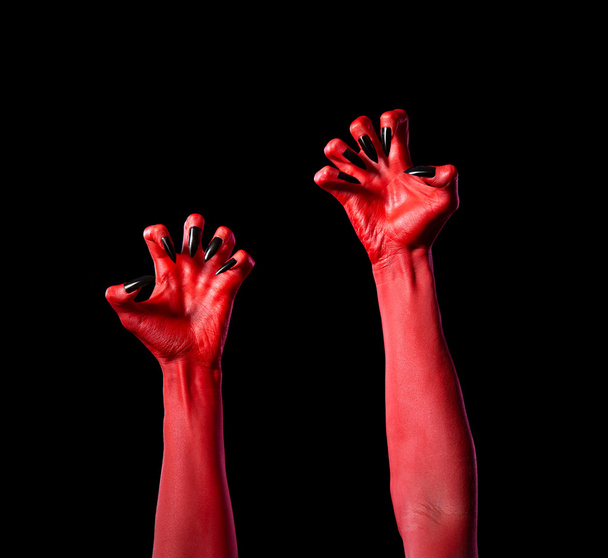 Red devil hands with black nails, real body-art  - Fotoğraf, Görsel